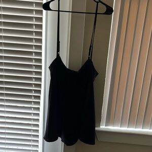 A line skirt with straps/suspenders